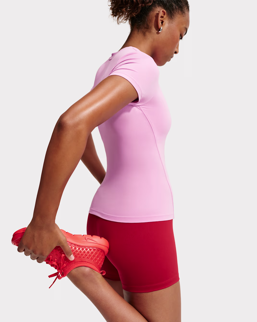 NIKE ONE WOMENS FITTED SHORT SLEEVED TOP PINK BLEIKUR - Image 4